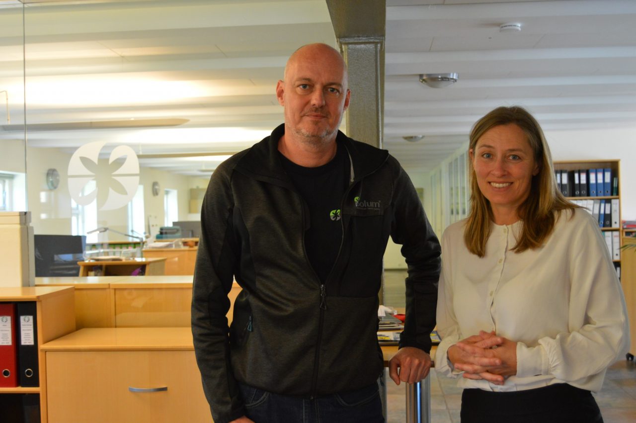 Two employees from Solum posing for at photo