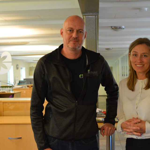 Two employees from Solum posing for at photo