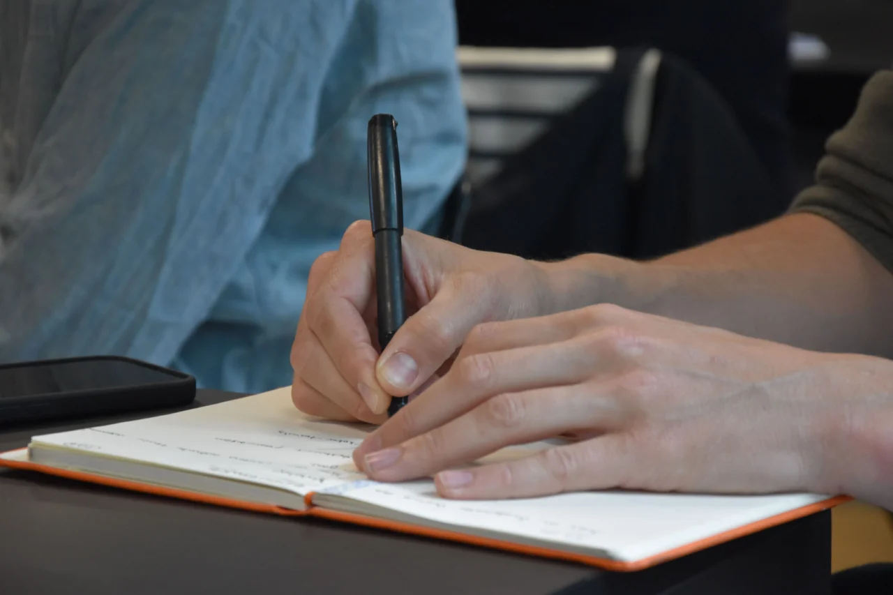 Participant taking notes during ENDURANCE workshop